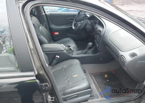 2000 Pontiac Grand Prix Gt z USA, uszkodzony, nr VIN 1G2WP52K0YF298936